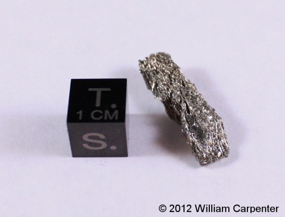 A small sample of scandium metal.